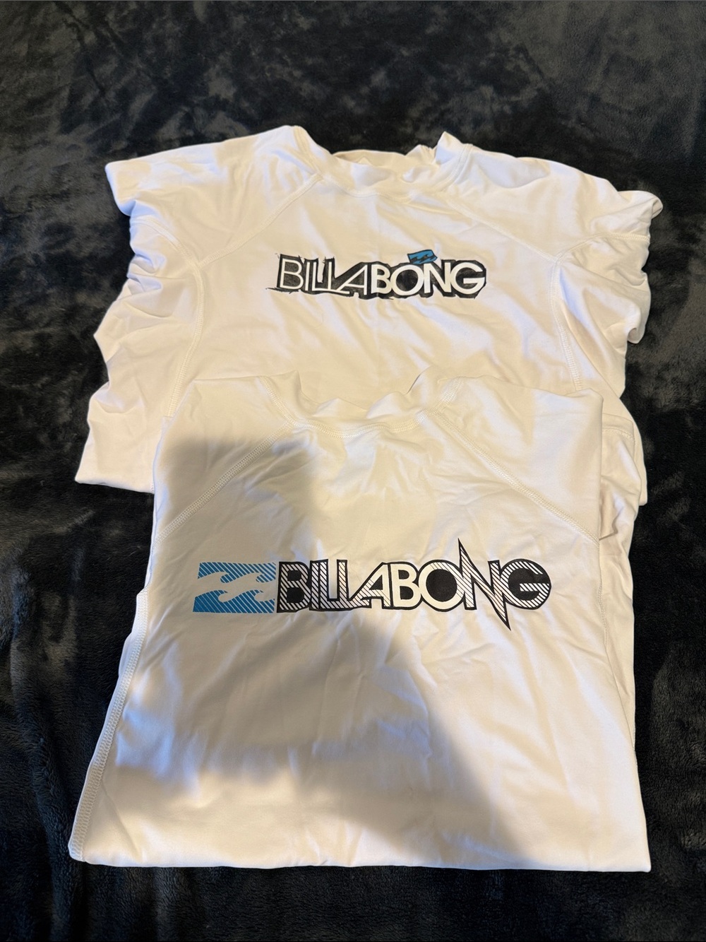 Two Billabong White Short Sleeve Surf SPF 50 Shirts. Unisex.